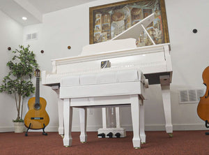 white hydraulic piano bench