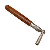 steel hardware close-up of the piano tuning hammer with rosewood handle