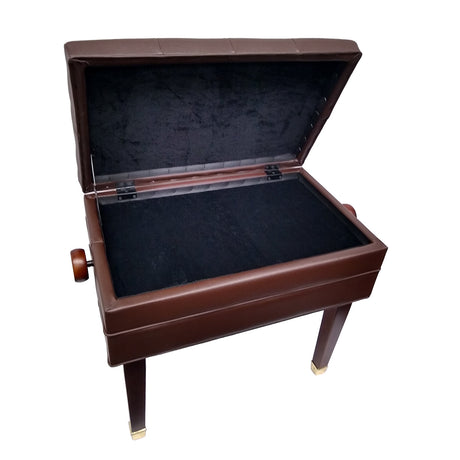 Open sheet music storage compartment under the seat of adjustable piano bench in satin mahogany finish.