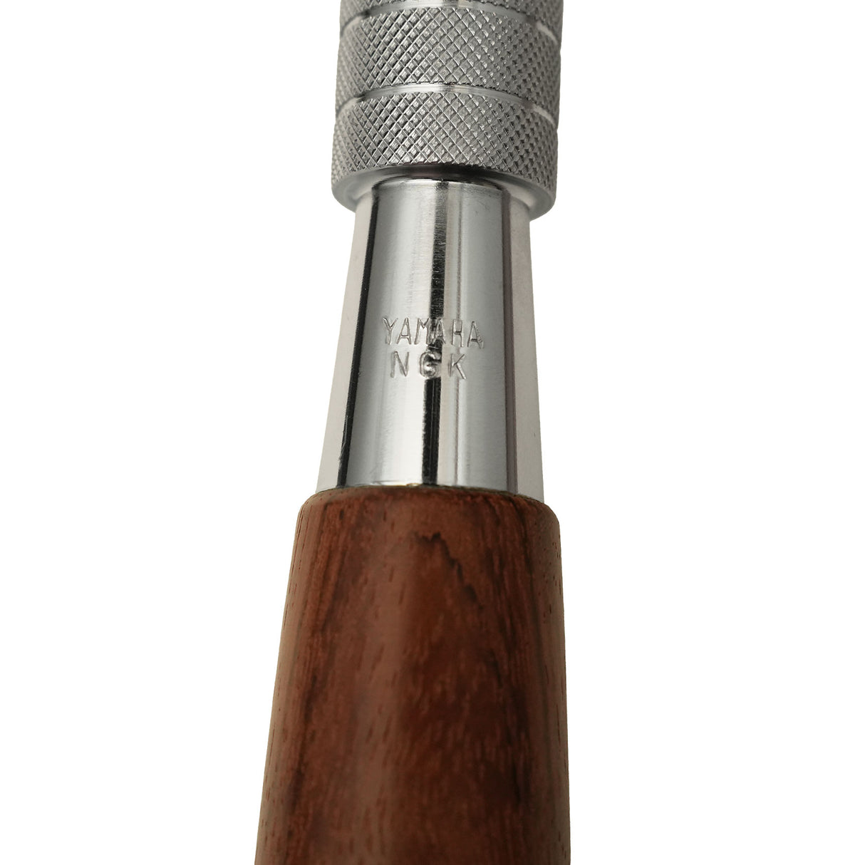 stamped Yamaha branded logo on piano tuning lever