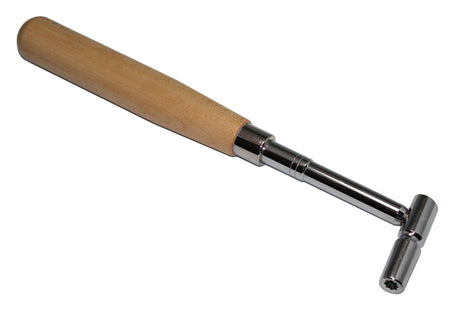 Close-up of star-shaped piano tuning hammer head with wooden handle