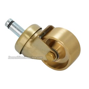 Close-up of Steinway-style brass piano caster – 2 inch wheel for grand piano