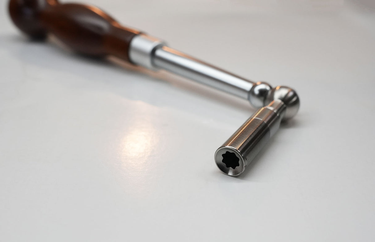 close-up of star shaped tip on the ball handle rosewood tuning lever