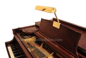 brass piano lamp with steinway piano